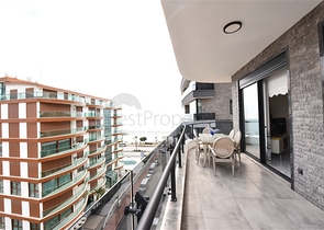 مجمع فاخر على البحر مباشرة - شقة غرفتين وصالة مفروشة - في اوبا / الانيا 