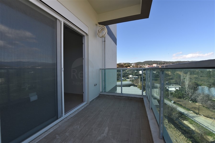 شقة ضمن مجمع يضم كافة الخدمات في افسلار / الانيا 