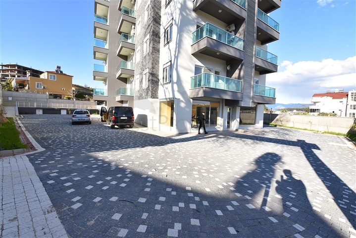 شقة ضمن مجمع يضم كافة الخدمات في افسلار / الانيا 