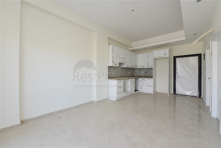 شقة ضمن مجمع يضم كافة الخدمات في افسلار / الانيا 