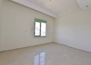 شقة ضمن مجمع يضم كافة الخدمات في افسلار / الانيا 