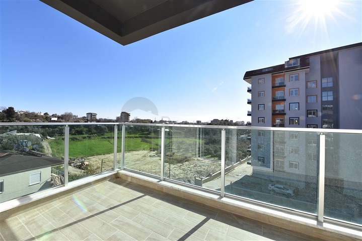 شقة غرفة وصالة -ضمن مجمع سكني جديد - في افسلار / الانيا 