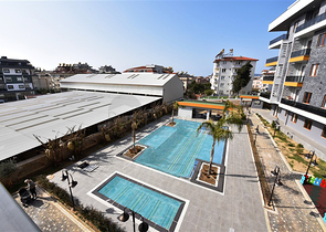 شقق للبيع في الانيا - غرفتين وصالة جديدة - ضمن مجمع سكني في اوبا / الانيا