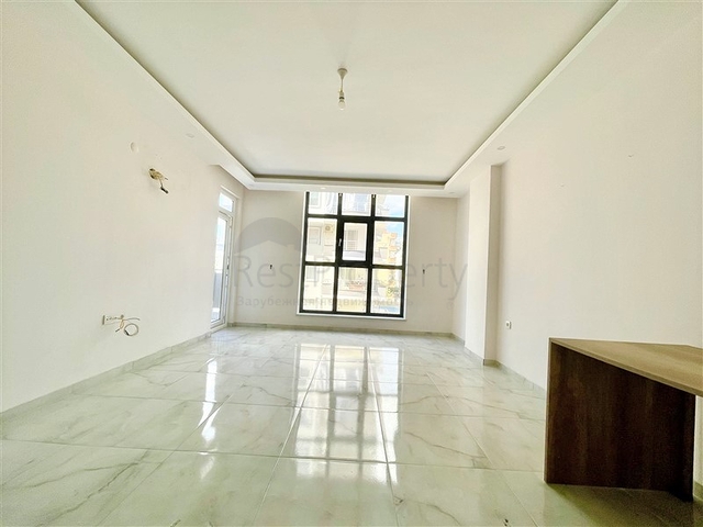 شقة جديدة بسعر مناسب - غرفة وصالة ضمن مجمع قريب من البحر - في محمودلار / الانيا 