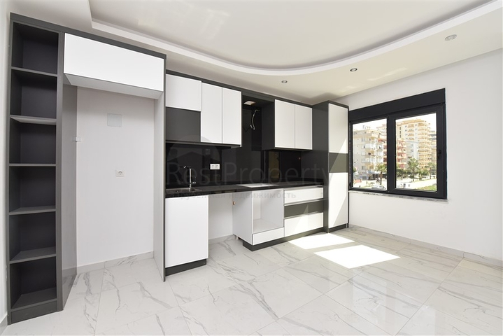 عقارات في الانيا - شقة غرفتين وصالة ضمن مجمع حديث - في منطقة محمودلار 