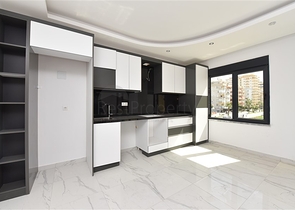 عقارات في الانيا - شقة غرفتين وصالة ضمن مجمع حديث - في منطقة محمودلار 