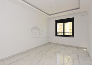 عقارات في الانيا - شقة غرفتين وصالة ضمن مجمع حديث - في منطقة محمودلار 