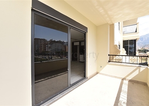 عقارات في الانيا - شقة غرفتين وصالة ضمن مجمع حديث - في منطقة محمودلار 