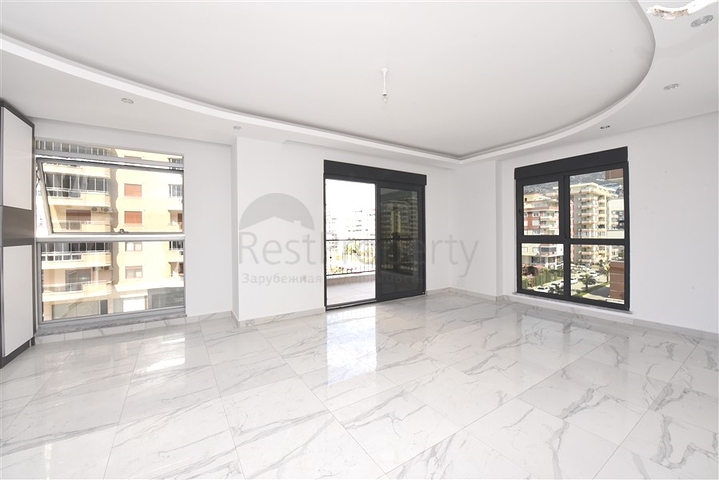 قريبة من البحر والخدمات - شقة غرفتين وصالة - ضمن مجمع عائلي انيق - محمودلار / الانيا 