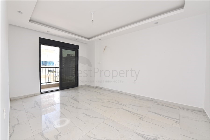 قريبة من البحر والخدمات - شقة غرفتين وصالة - ضمن مجمع عائلي انيق - محمودلار / الانيا 