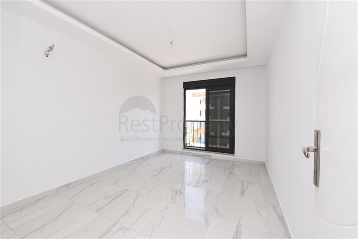 قريبة من البحر والخدمات - شقة غرفتين وصالة - ضمن مجمع عائلي انيق - محمودلار / الانيا 