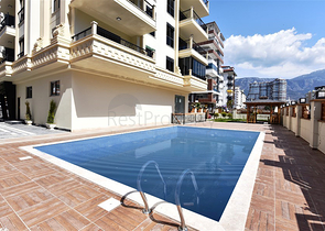 قريبة من البحر والخدمات - شقة غرفتين وصالة - ضمن مجمع عائلي انيق - محمودلار / الانيا 