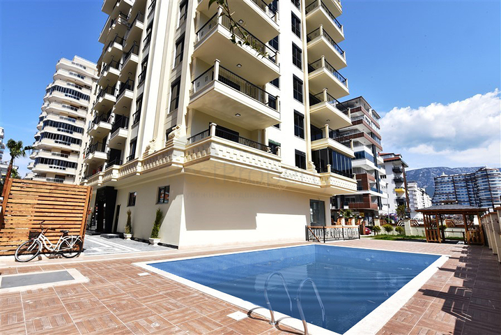 شقق للبيع في الانيا - ضمن مجمع فاخر قريب من البحر والاسواق - غرفتين وصالة -محمودلار / الانيا 