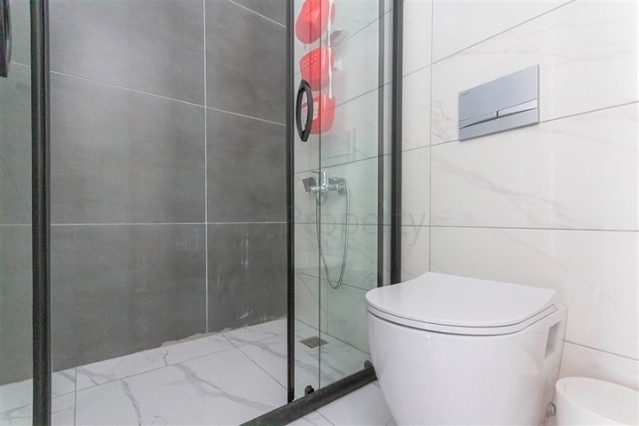 شقة غرفة وصالة ضمن مجمع حديث - في محمودلار / الانيا 