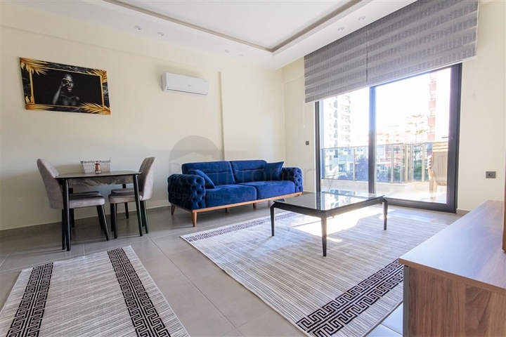 شقة غرفة وصالة ضمن مجمع حديث - في محمودلار / الانيا 