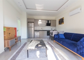 شقة غرفة وصالة ضمن مجمع حديث - في محمودلار / الانيا 