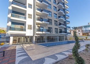 شقة غرفة وصالة ضمن مجمع حديث - في محمودلار / الانيا 