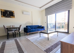 شقة غرفة وصالة ضمن مجمع حديث - في محمودلار / الانيا 