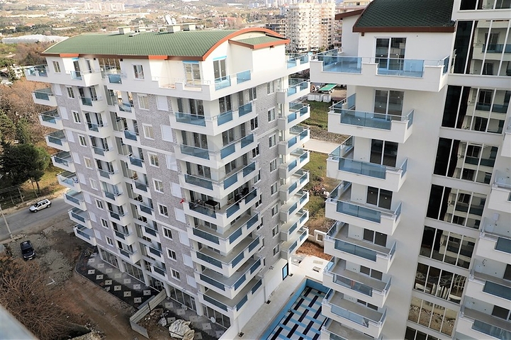 مطبخ منفصل - شقة غرفتين وصالة واسعة -مجمع سكني حديث - في محمودلار / الانيا 