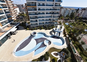 ضمن مجمع فاخر - شقة غرفتين وصالة مفروشة - في توسمور / الانيا 