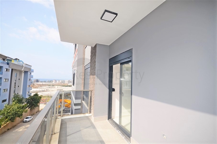 شقة غرفة وصالة - مجمع سكني انيق - في كارجيجاك / الانيا 