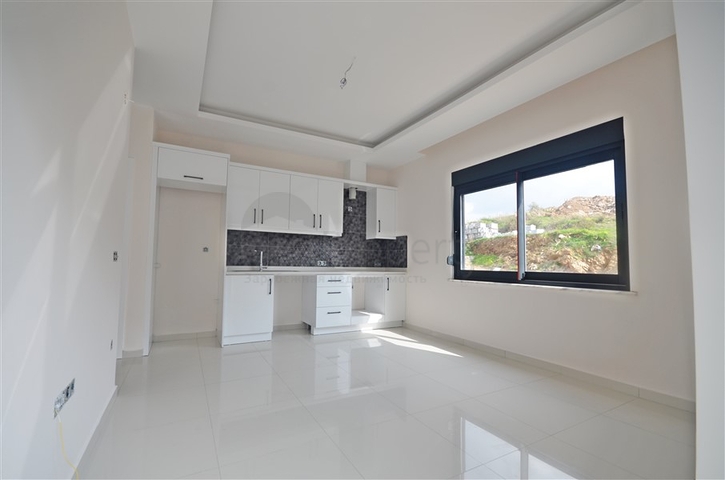 شقة غرفة وصالة - مجمع سكني انيق - في كارجيجاك / الانيا 