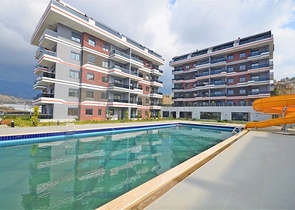 شقة غرفة وصالة - مجمع سكني انيق - في كارجيجاك / الانيا 