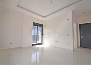 شقة غرفة وصالة - مجمع سكني انيق - في كارجيجاك / الانيا 