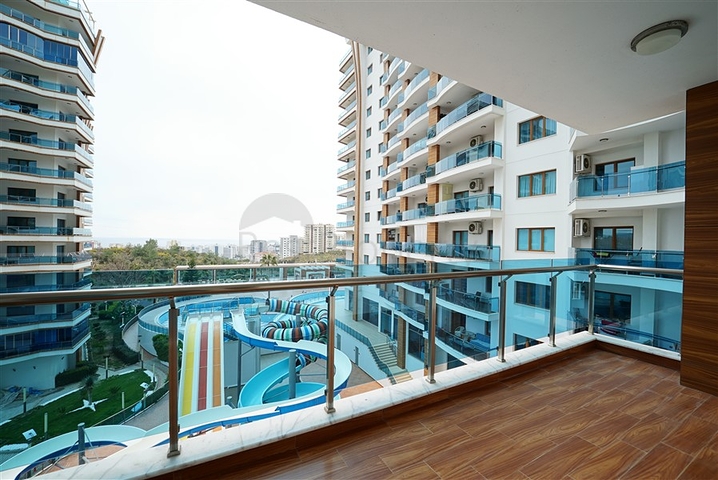 شقة غرفتين وصالة مفروشة - مجمع بخدمات 5 نجوم - في محمودلار / الانيا 