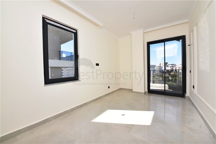 شقة جديدة - غرفة وصالة ضمن مجمع سكني - في محمودلار / الانيا 