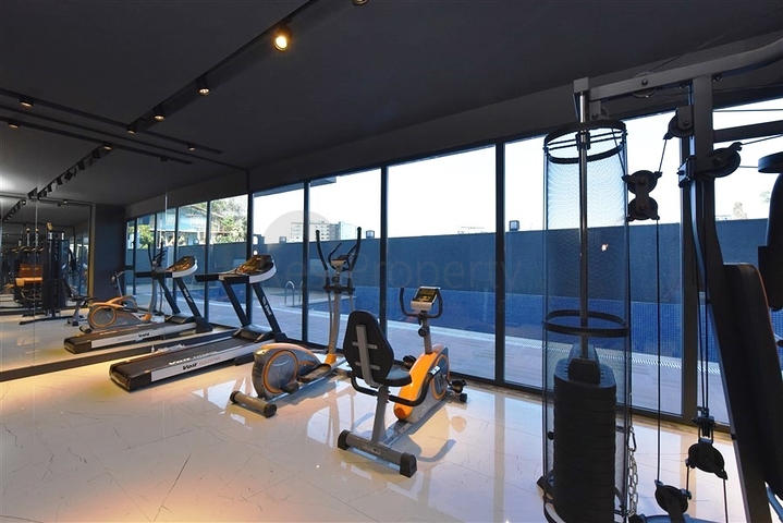 شقة جديدة - غرفة وصالة ضمن مجمع سكني - في محمودلار / الانيا 