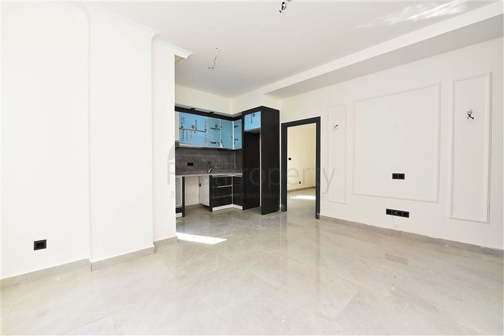 شقة جديدة - غرفة وصالة ضمن مجمع سكني - في محمودلار / الانيا 