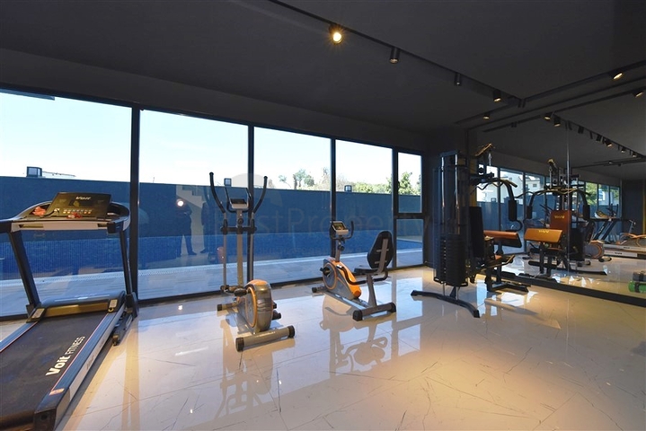 شقة جديدة - غرفة وصالة ضمن مجمع سكني - في محمودلار / الانيا 