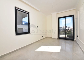 شقة جديدة - غرفة وصالة ضمن مجمع سكني - في محمودلار / الانيا 