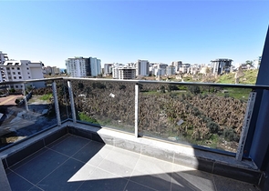 شقة جديدة - غرفة وصالة ضمن مجمع سكني - في محمودلار / الانيا 