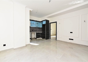 شقة جديدة - غرفة وصالة ضمن مجمع سكني - في محمودلار / الانيا 