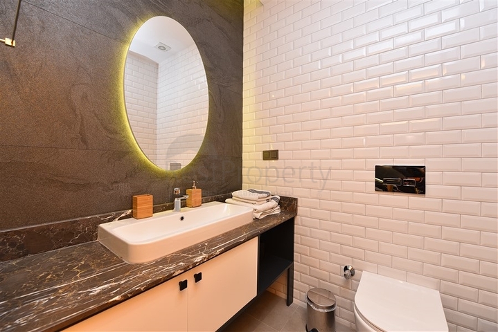 موقع مركزي - شقة غرفة وصالة مفروشة - ضمن مجمع حديث - في مركز الانيا 