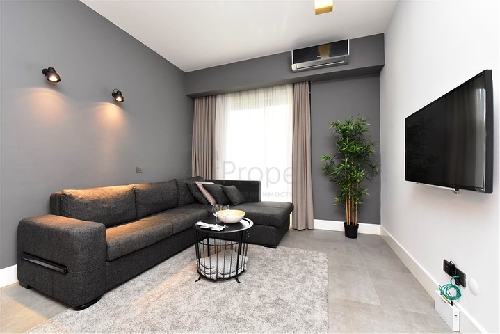 موقع مركزي - شقة غرفة وصالة مفروشة - ضمن مجمع حديث - في مركز الانيا 