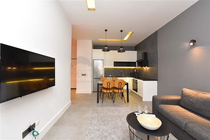 موقع مركزي - شقة غرفة وصالة مفروشة - ضمن مجمع حديث - في مركز الانيا 