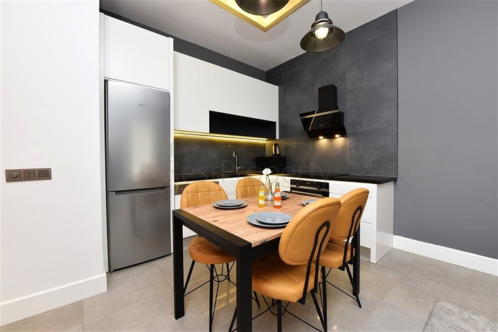 موقع مركزي - شقة غرفة وصالة مفروشة - ضمن مجمع حديث - في مركز الانيا 