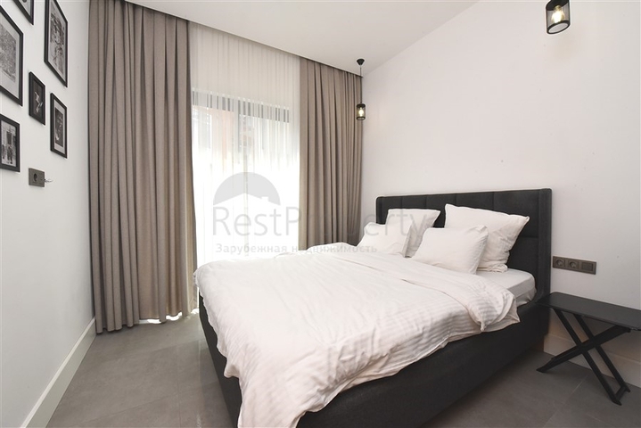 موقع مركزي - شقة غرفة وصالة مفروشة - ضمن مجمع حديث - في مركز الانيا 