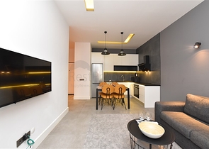 موقع مركزي - شقة غرفة وصالة مفروشة - ضمن مجمع حديث - في مركز الانيا 