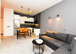 موقع مركزي - شقة غرفة وصالة مفروشة - ضمن مجمع حديث - في مركز الانيا 