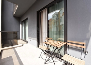 موقع مركزي - شقة غرفة وصالة مفروشة - ضمن مجمع حديث - في مركز الانيا 