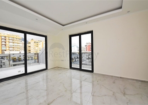 دوبلكس جديدة للبيع - تصميم غرفتين وصالة - ضمن مجمع سكني في محمودلار / الانيا 