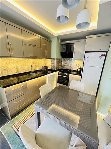 شقة غرفتين وصالة مفروشة - ضمن مجمع سكني في محمودلار / الانيا 