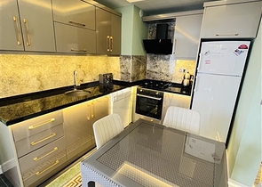 شقة غرفتين وصالة مفروشة - ضمن مجمع سكني في محمودلار / الانيا 