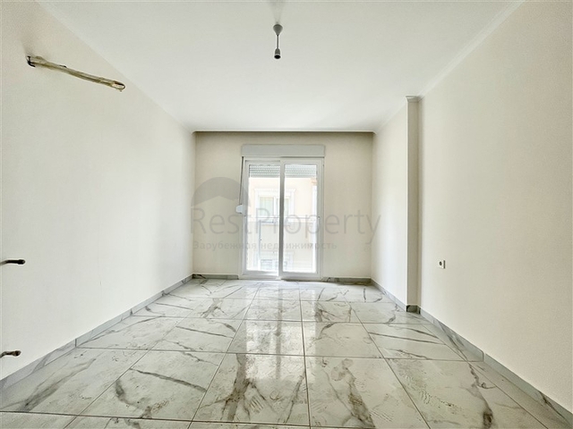 شقة جديدة - غرفتين وصالة - ضمن مجمع - في محمودلار / الانيا 