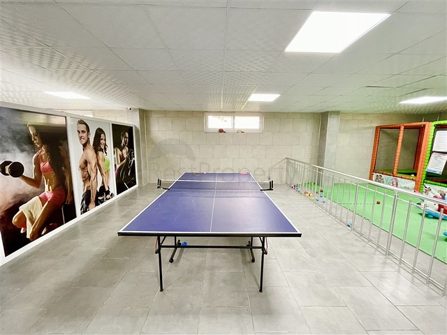 شقة جديدة - غرفتين وصالة - ضمن مجمع - في محمودلار / الانيا 