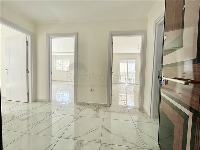 شقة جديدة - غرفتين وصالة - ضمن مجمع - في محمودلار / الانيا 